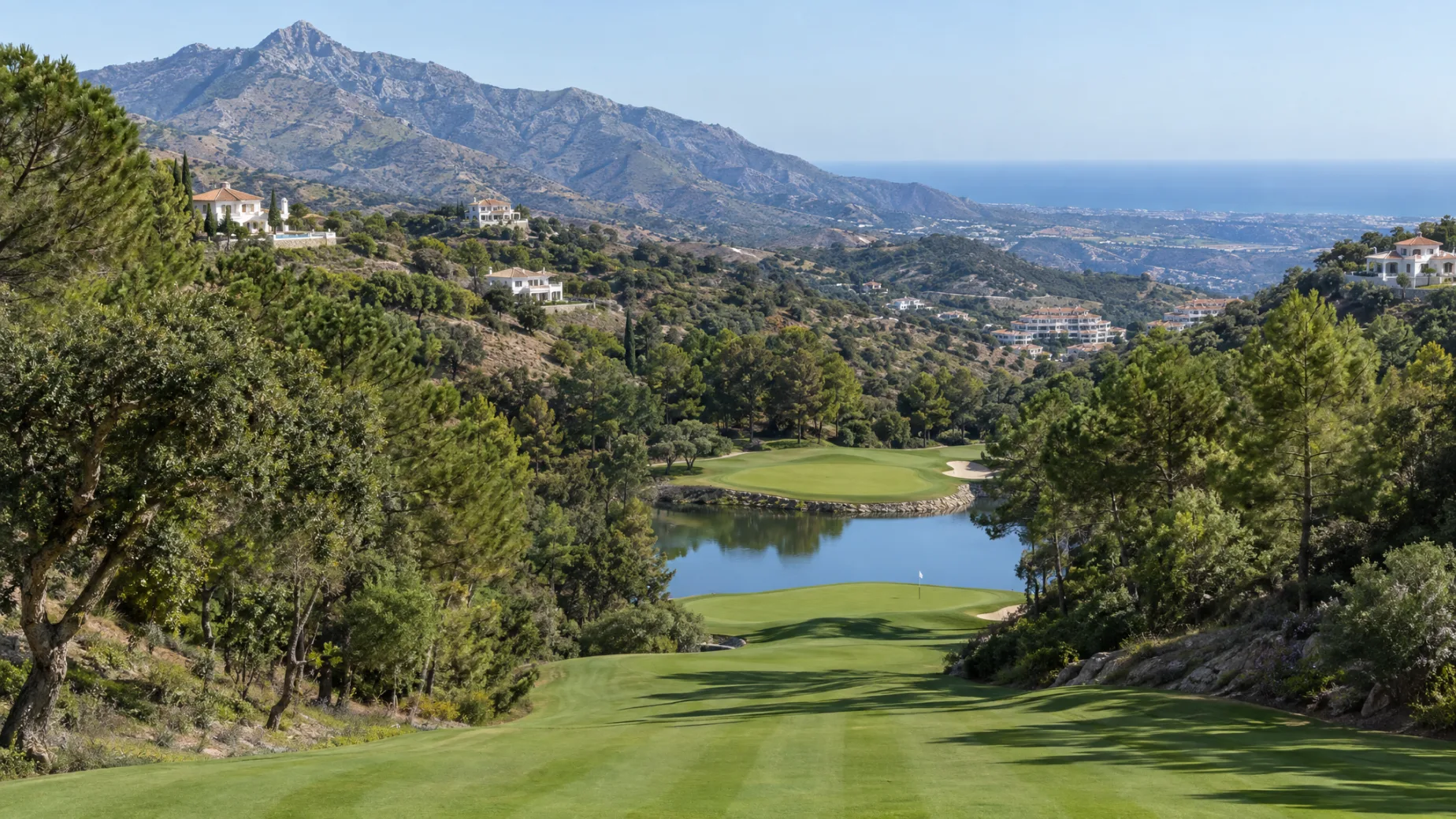Properties for sale at Marbella Club Golf Resort: new homes above a hillside course with lakes in Benahavís