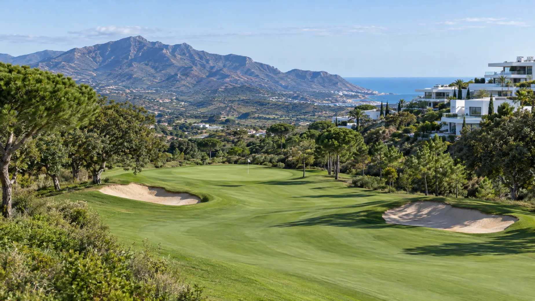 Properties for sale at Valle Romano Golf: new homes above a wide championship fairway in the valley behind Estepona